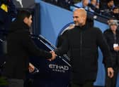 MANCHESTER, ENGLAND - JANUARY 27: Mikel Arteta, Manager of Arsenal, shakes hands with Pep Guardiola, Manager of Manchester City, prior to the Emirates FA Cup Fourth Round match between Manchester City and Arsenal at Etihad Stadium on January 27, 2023 in Manchester, England. (Photo by Michael Regan/Getty Images)